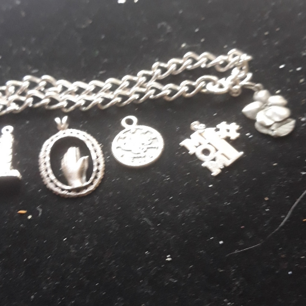 Ladies sterling silver charm bracelet with 5 charm